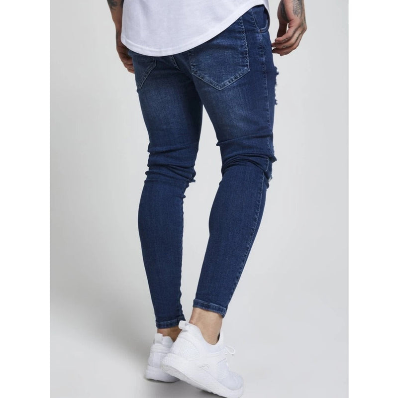 Calça Jeans Rasgada Skinny com Ziper